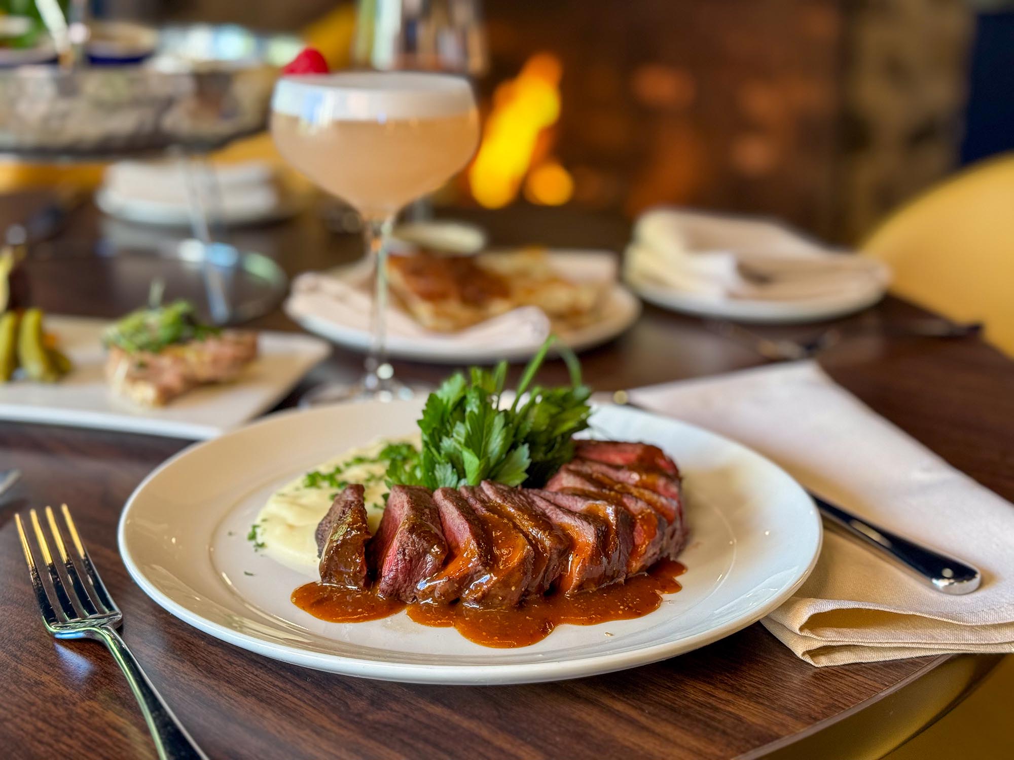 Sliced filet and cocktail at the Carriage House